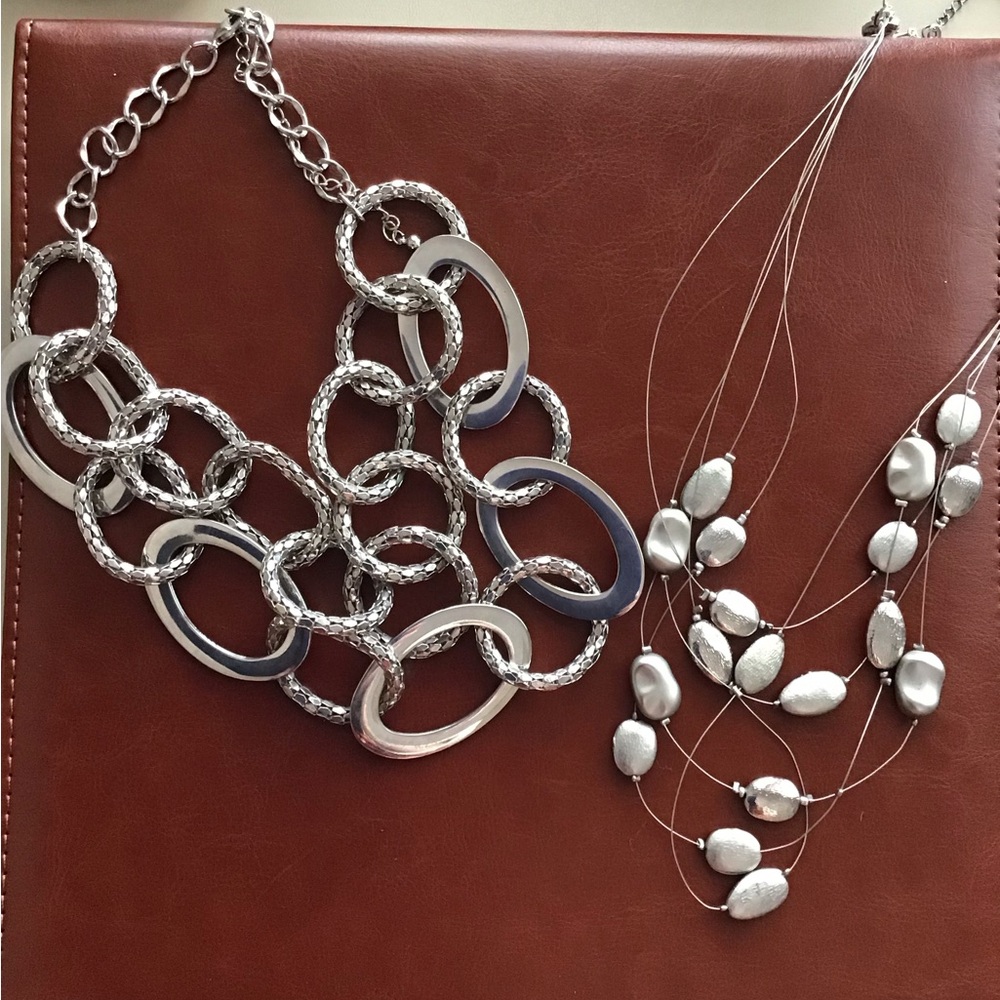2 silver tone statement necklaces